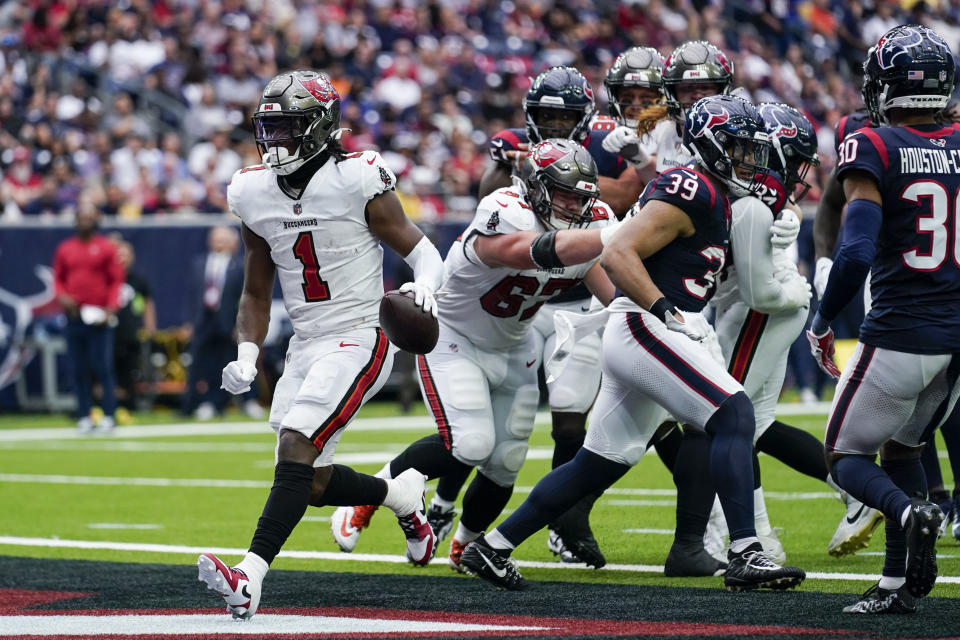 Tampa Bay Buccaneers running back Rachaad White scores on a touchdown run against the Houston Texans during the first half of an NFL football game, Sunday, Nov. 5, 2023, in Houston. (AP Photo/Eric Gay)