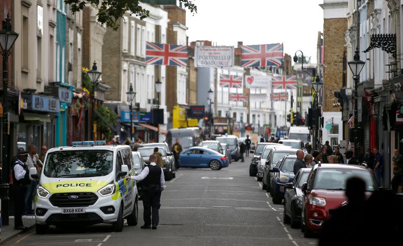 Police officers are seen in Portobello Road where Carnival is normally held annually, amid the coronavirus disease (COVID-19) outbreak, in London