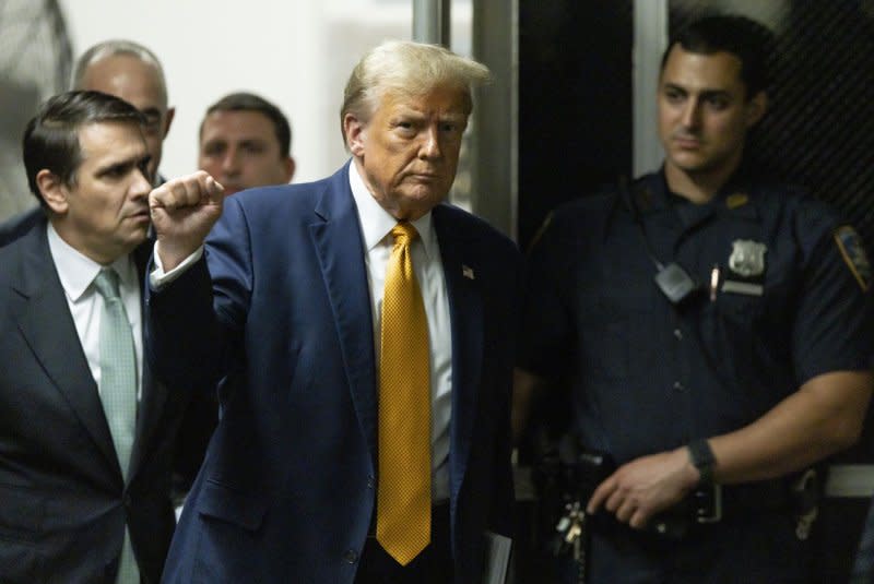 Former President Donald Trump returns to the courtroom for his criminal trial at Manhattan Criminal Court in New York on Tuesday. Trump and his one-time fixer reportedly have been making little to no eye contact. Pool photo by Justin Lane/UPI