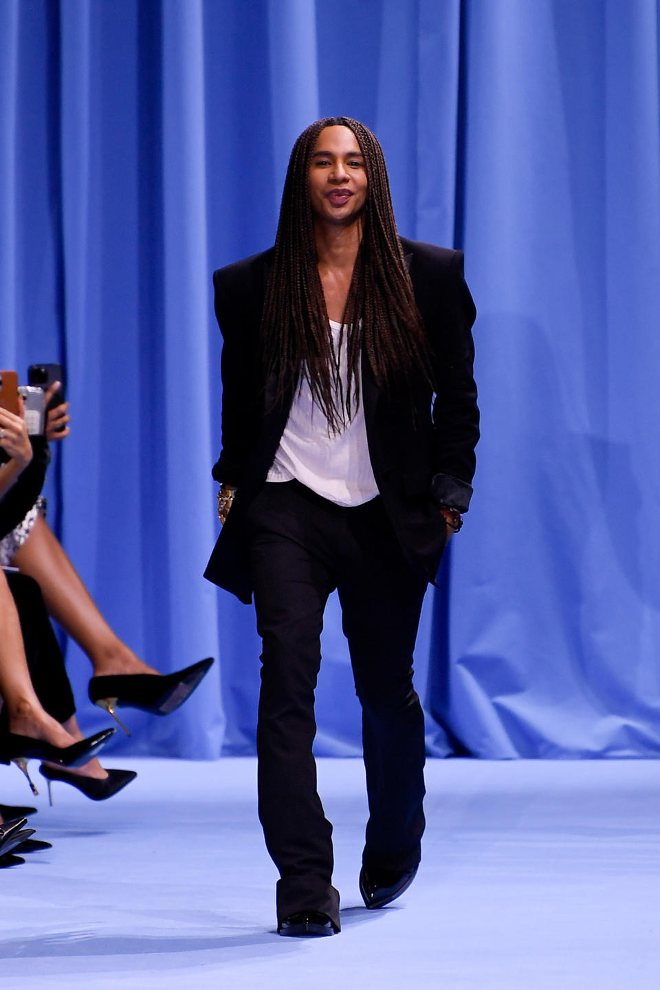 Olivier Rousteing on the runway at Balmain RTW Spring 2024.