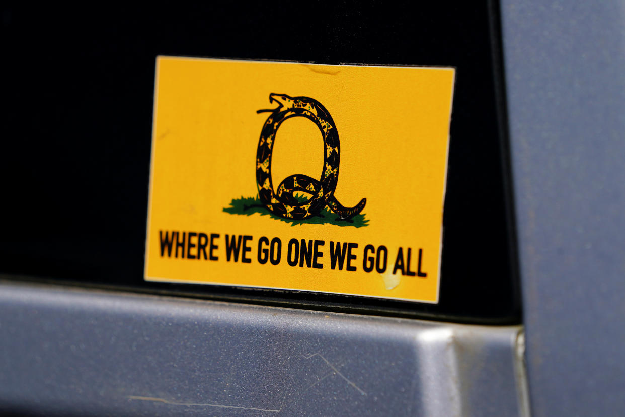 A sticker that references the QAnon slogan is seen on a truck that participated in a caravan convoy in Adairsville, Georgia, U.S. September 5, 2020.    REUTERS/Elijah Nouvelage