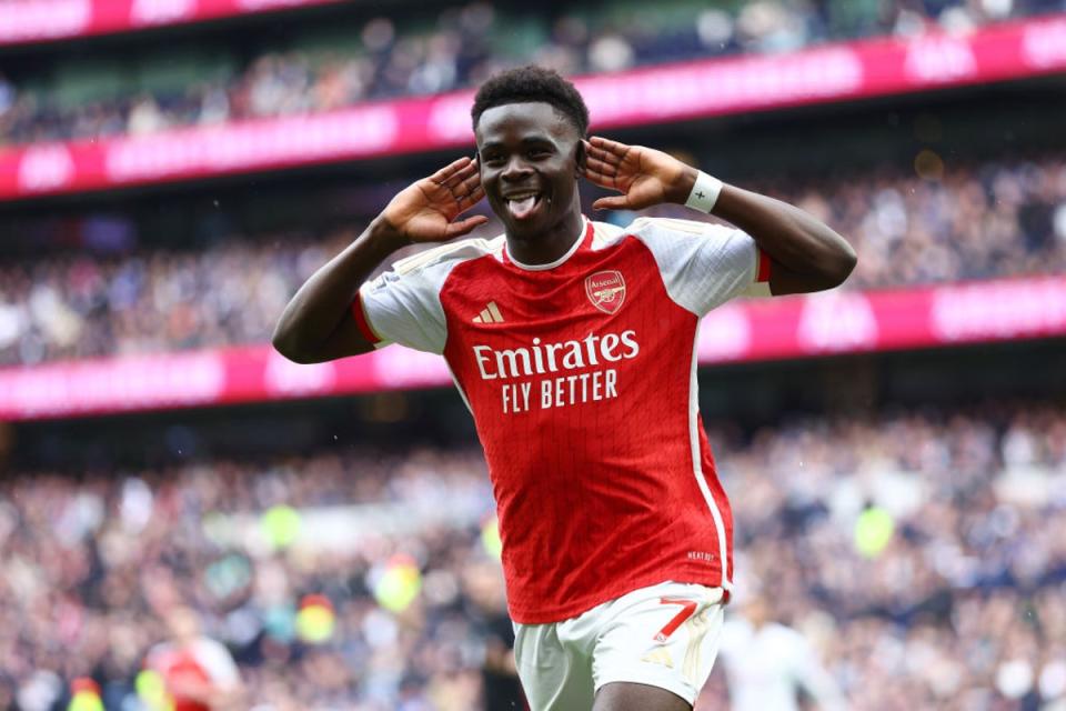 Bukayo Saka celebrates after scoring Arsenal’s second goal (Getty)