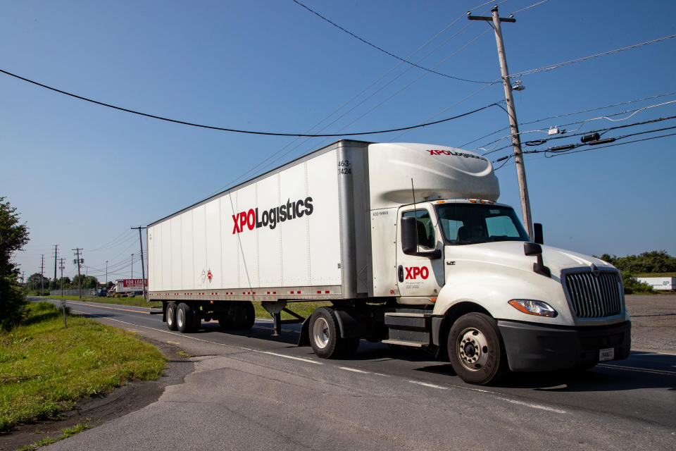 NEW COLUMBIA, PENNSYLVANIA, UNITED STATES - 2021/08/12: An XPO Logistics truck  is seen driving on a rural road in Pennsylvania.
United States Postmaster General Louis DeJoy was formerly the supply chain chief executive with XPO Logistics. The United States Postal Service now contracts with the logistics company. (Photo by Paul Weaver/SOPA Images/LightRocket via Getty Images)