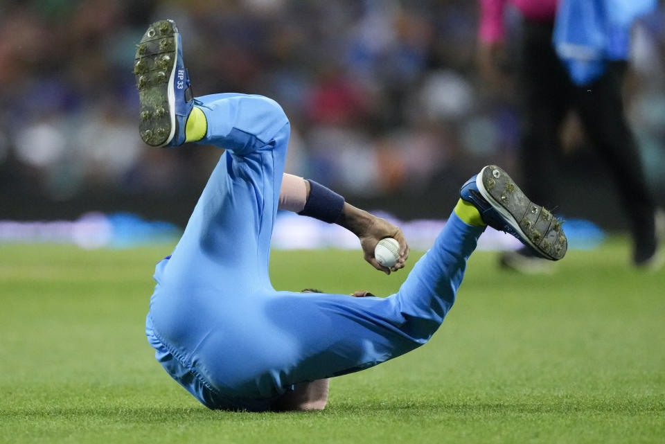 India's Hardik Pandya falls while fielding during the T20 World Cup cricket match between India and the Netherlands in Sydney, Australia, Thursday, Oct. 27, 2022. (AP Photo/Rick Rycroft)