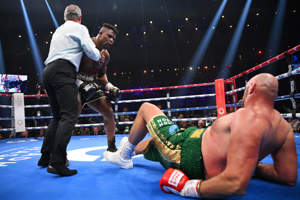 Francis Ngannou (pictured left) knocked down Tyson Fury (pictured right) in their heavyweight fight. (Photo by Justin Setterfield/Getty Images)