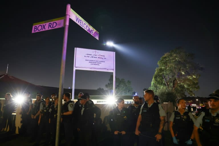 New South Wales police guard the perimeter of the Christ the Good Shepherd Church in Sydney's western suburb of Wakeley on April 15, 2024, after several people were stabbed in the church premises. Australian police arrested a man after several people were stabbed at a church in Sydney on April 15 and emergency services said four people were being treated for non-life threatening injuries. (DAVID GRAY)