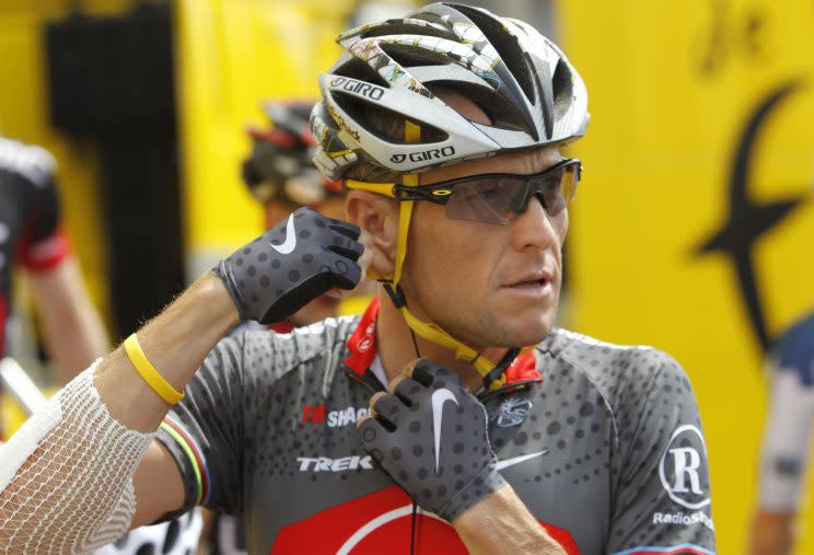 Armstrong arrives prior to the start of the third stage of the 2010 Tour de France. (AP Photo/Christophe Ena, FIle)