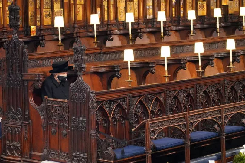 Queen Elizabeth II takes her seat during the funeral of Prince Philip, Duke of Edinburgh, at St George's Chapel at Windsor Castle on April 17, 2021 -Credit:Getty Images