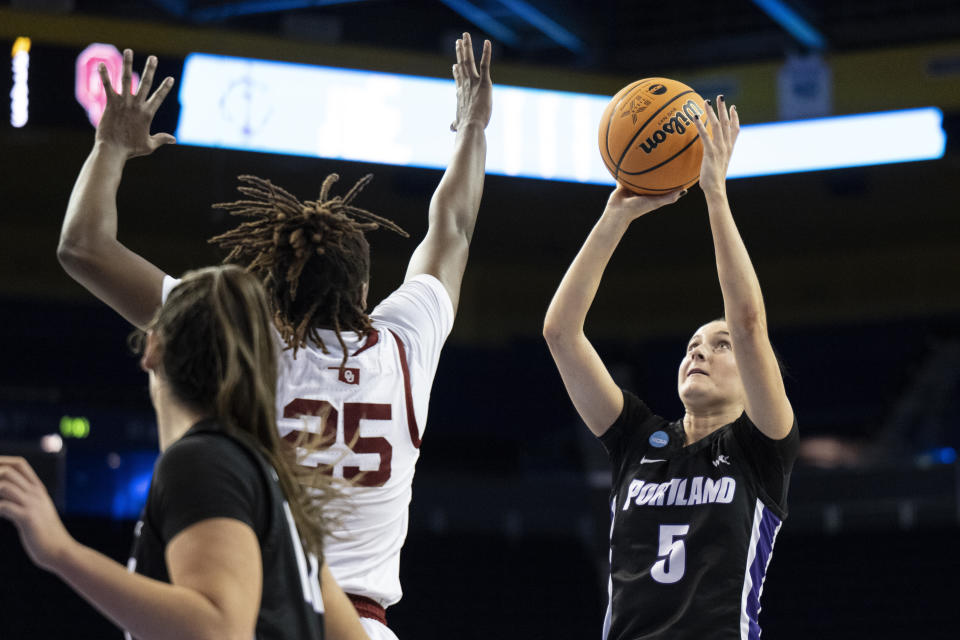 Portland guard Emme Shearer (5) shoots over Oklahoma forward Madi Williams (25) during the second half of a first-round college basketball game in the women's NCAA Tournament, Saturday, March 18, 2023, in Los Angeles. (AP Photo/Kyusung Gong)