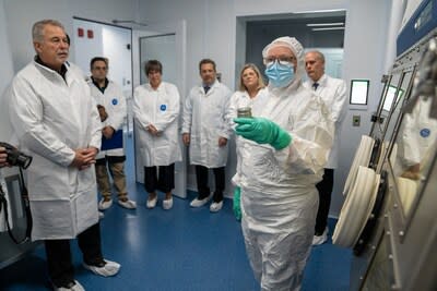 A radiochemist demonstrates Fusion's radiopharmaceutical manufacturing capabilities.