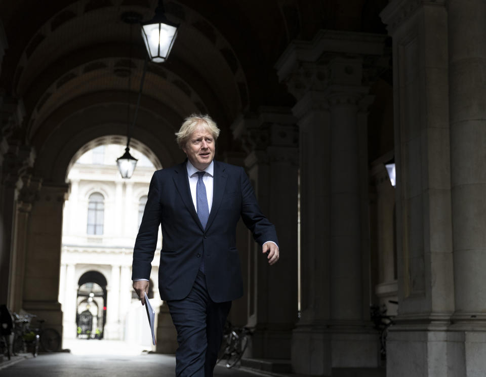 LONDON, Sept. 8, 2020  -- British Prime Minister Boris Johnson walks back to 10 Downing Street in London, Britain, Sept. 8, 2020.   Crucial talks aimed at finding a post-Brexit trade deal between Britain and the European Union (EU) opened Tuesday in London.    Boris Johnson said Monday that he wants a post-Brexit trade deal agreed with EU by an Oct. 15 deadline, warning that a failure of that could mean London ending its EU membership with no deal. (Photo by Han Yan/Xinhua via Getty) (Xinhua/Han Yan via Getty Images)