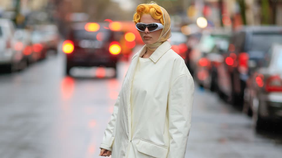 The same day, Julia Fox was spotted in another headscarf — styled with her Velveeta cheese curls and chunky boots. - Rachpoot/Bauer-Griffin/GC Images/Getty Images