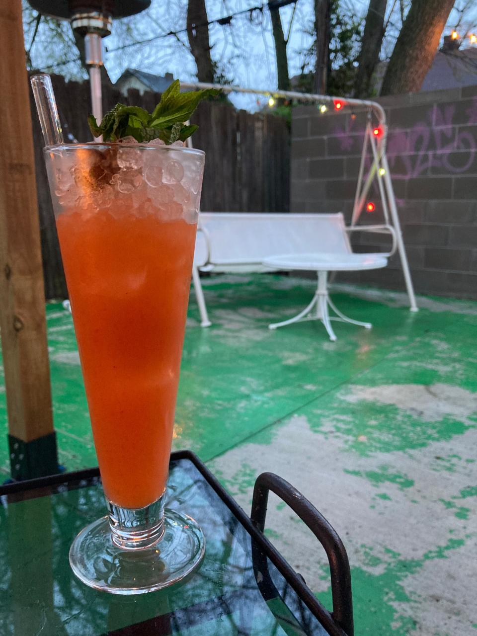 The Karate Kick cocktail served on the patio at The Bartender's Handshake