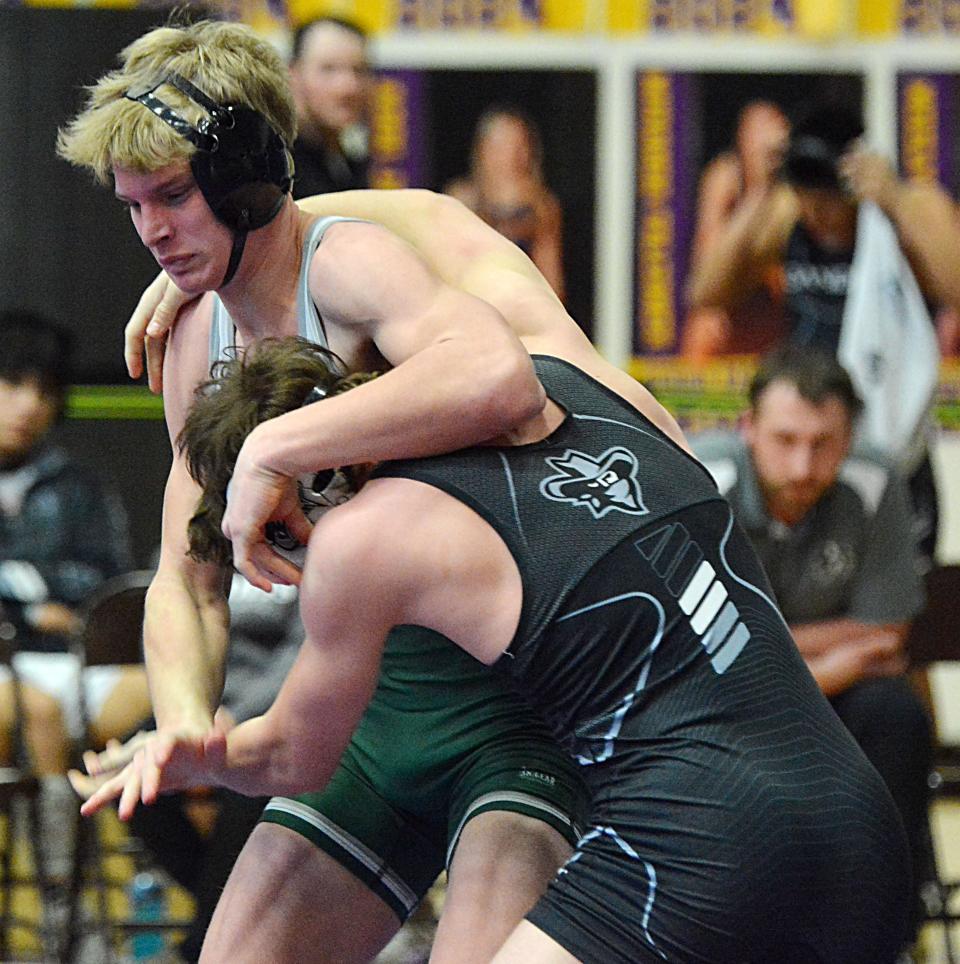 Clark-Willow Lake's Lincoln Reidburn attempts to break from Miller/Highmore-Harrold's Ryder Rowland at 157 pounds during their consolation semifinal dual in the State Class B Dual Wrestling Championship on Saturday, Feb. 10, 2024 in the Watertown Civic Arena.