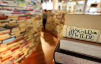 A visitor walks in the 'aMAZEme' labyrinth made from books at The Southbank Centre on July 31, 2012 in London, England. (Photo by Peter Macdiarmid/Getty Images)