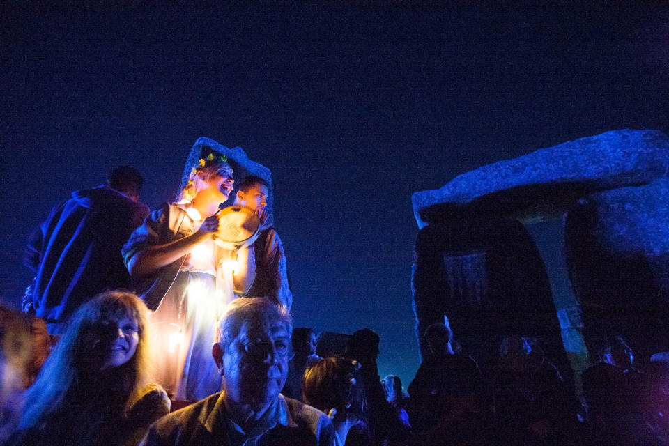 <p>Revellers celebrate summer solstice and the dawn of the longest day of the year at Stonehenge on June 21, 2017 in Wiltshire, England. (Photo: Kiran Ridley/Barcroft Images/Barcroft Media via Getty Images) </p>