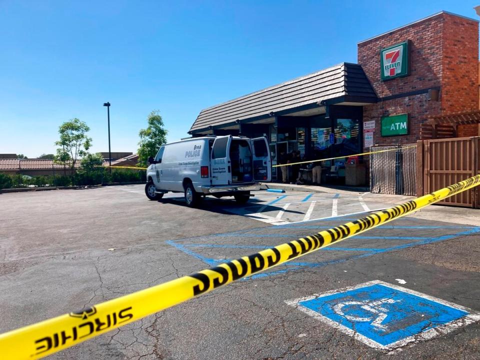 Police investigate a shooting at a 7-Eleven store in Brea, Calif., on Monday, July 11, 2022. (AP)