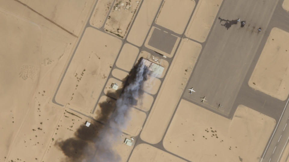 This satellite photo from Planet Labs PBC shows a fire at a hangar at Merowe air base, Sudan, Tuesday, April 18, 2023. Explosions and heavy gunfire rattled the Sudanese capital in a fifth day of fighting Wednesday, April 19, 2023, after an internationally brokered truce quickly fell apart. The cease-fire failure suggested the two rival generals fighting for control of the country were determined to crush each other in a potentially prolonged conflict. (Planet Labs PBC via AP)