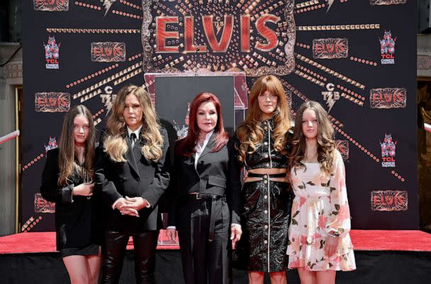 PHOTO: (L-R) Harper Vivienne Ann Lockwood, Lisa Marie Presley, Priscilla Presley, Riley Keough, and Finley Aaron Love Lockwood attend the Handprint Ceremony honoring Three Generations of Presley's at TCL Chinese Theatre, June 21, 2022, in Los Angeles. (Axelle/Bauer-Griffin/FilmMagic via Getty Images)