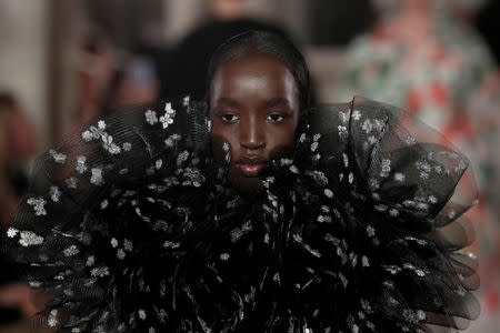 A model presents a creation by Italian designer Pier Paolo Piccioli as part of his Haute Couture Spring-Summer 2019 collection show for fashion house Valentino in Paris, France, January 23, 2019. REUTERS/Benoit Tessier