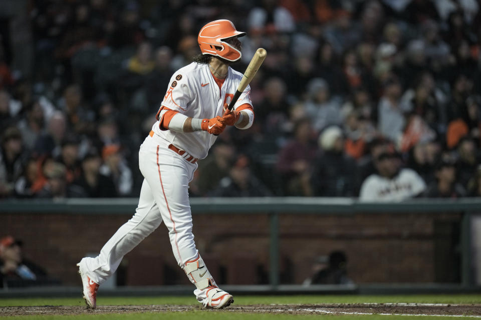 San Francisco Giants' Brandon Crawford watches his two-run home run against the Arizona Diamondbacks during the sixth inning of a baseball game Tuesday, Aug. 1, 2023, in San Francisco. (AP Photo/Godofredo A. Vásquez)