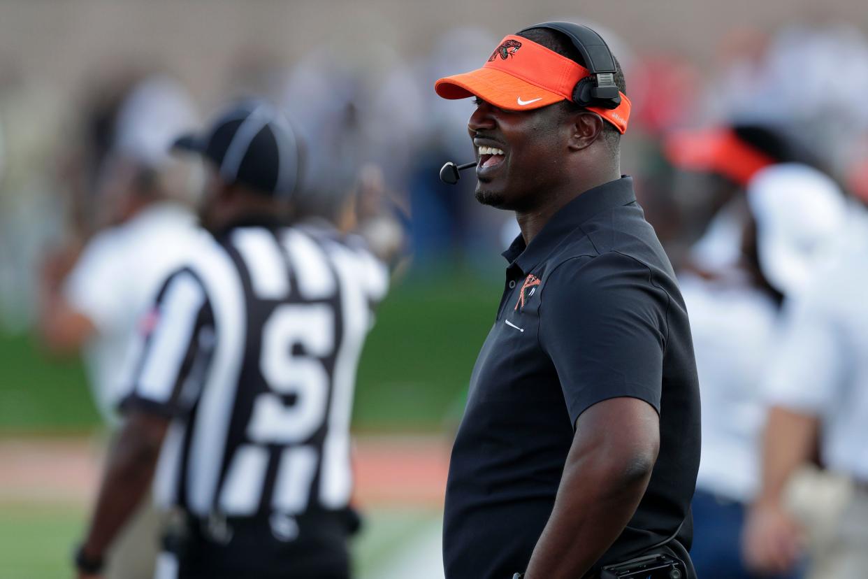 Florida A&M head coach Willie Simmons smiles after his players scored a touchdown. The Rattlers beat the Fort Valley State Wildcats 57-20 for their first home game of the season Saturday, Sept. 14, 2019.