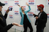 Democratic presidential candidate Sen. Elizabeth Warren, D-Mass., reacts while meeting with people at a campaign office, Thursday, Feb. 20, 2020, in North Las Vegas, Nev. (AP Photo/John Locher)