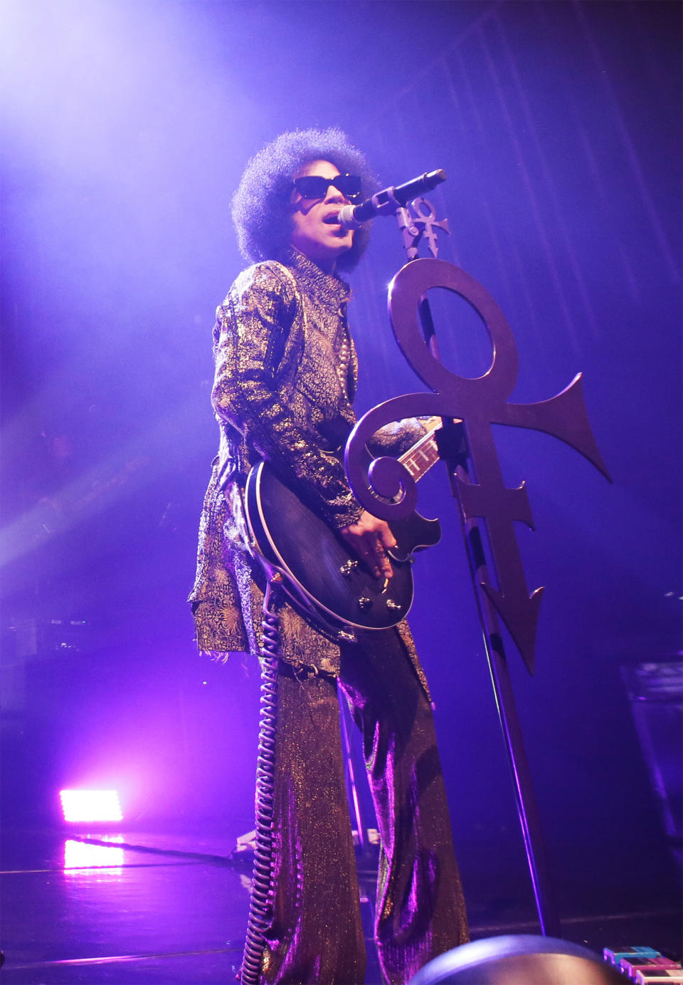 Prince performs onstage during the “HitnRun” tour at The Fox Theatre on April 9, 2015 in Detroit, Michigan.