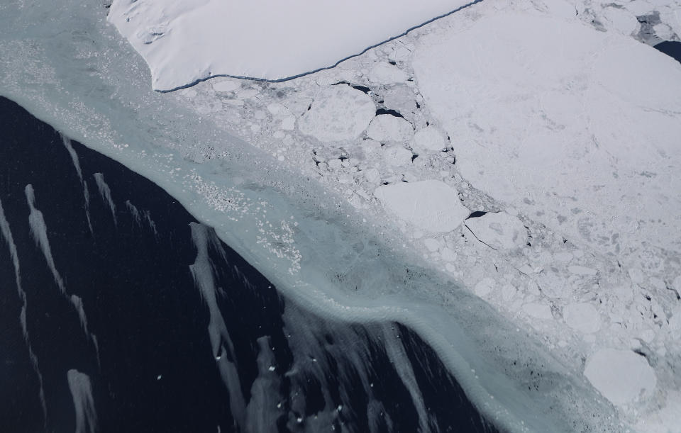 <p>Sea ice floes as seen from NASA’s Operation IceBridge research aircraft in the Antarctic Peninsula region on Nov. 4, 2017, above Antarctica. (Photo: Mario Tama/Getty Images) </p>