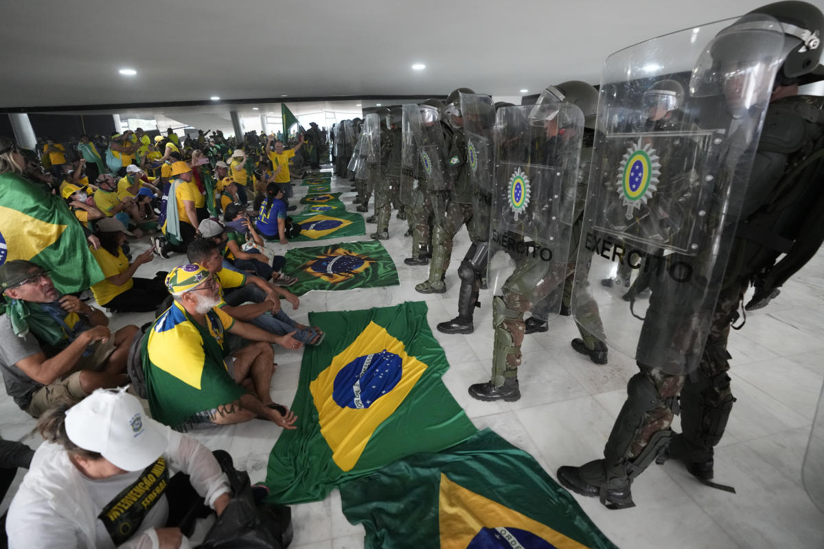 EXPLAINER: Roots of the Brazilian capital’s chaotic uprising