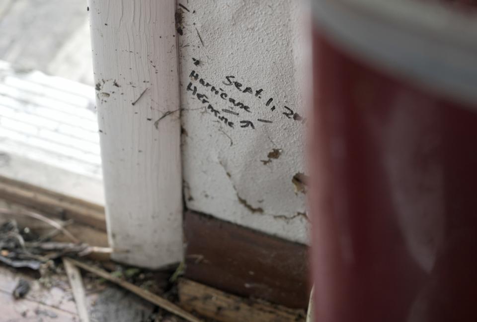 Herman Neeley’s home in Horseshoe Beach, Fl. was destroyed when Hurricane Idalia hit. The marker on his home was the water level when Hurricane Hermine hit in 2016.