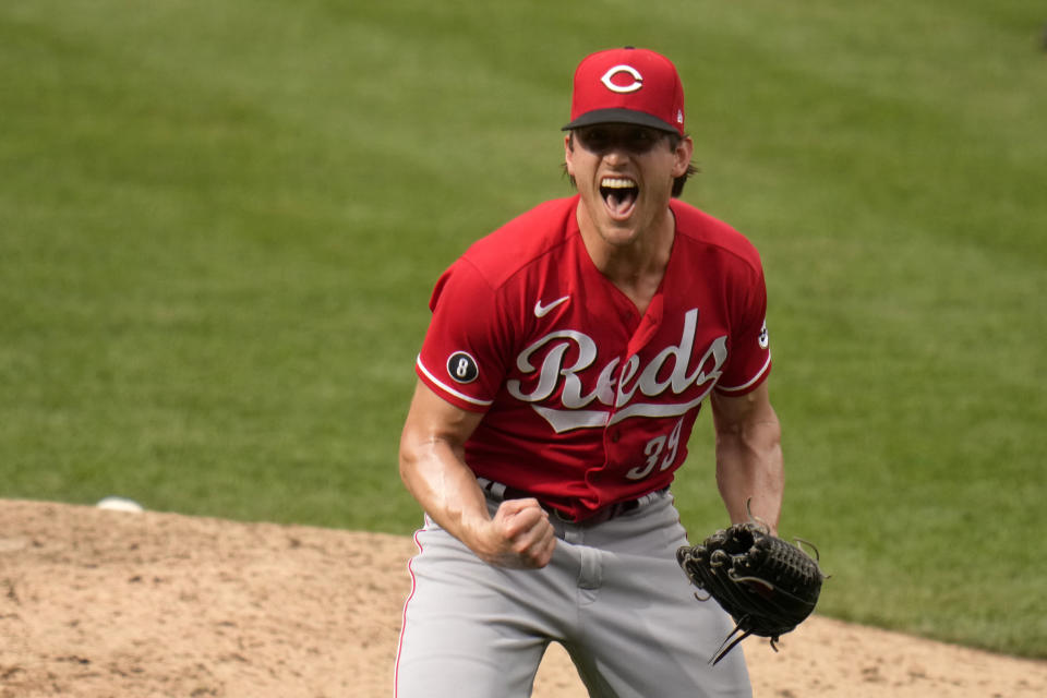 Cincinnati Reds pitcher Lucas Sims celebrates after striking out St. Louis Cardinals' Jose Rondon for the final out of a baseball game Sunday, June 6, 2021, in St. Louis. The Reds won 8-7. (AP Photo/Jeff Roberson)