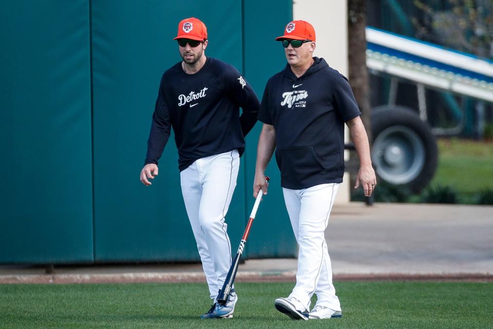 Detroit Tigers manager A.J. Hinch talks to outfielder Matt Vierling during spring training at TigerTown in Lakeland, Fla. on Monday, Feb. 19, 2024.