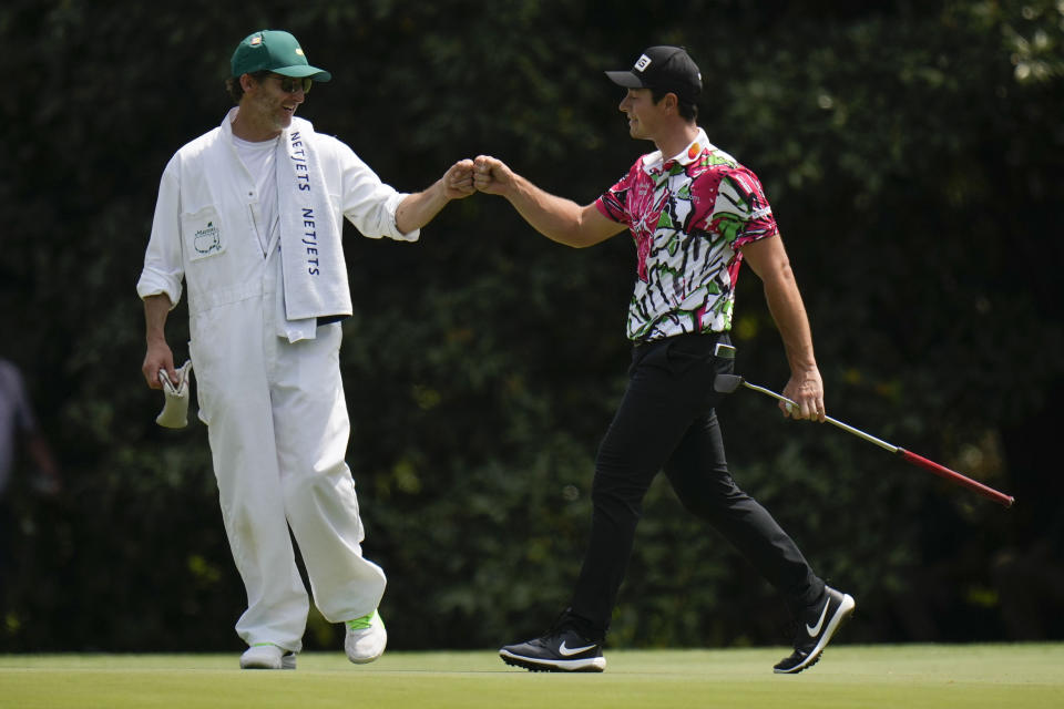 Viktor Hovland, of Norway, celebrates after a putt the 11th hole during the first round of the Masters golf tournament at Augusta National Golf Club on Thursday, April 6, 2023, in Augusta, Ga. (AP Photo/Jae C. Hong)