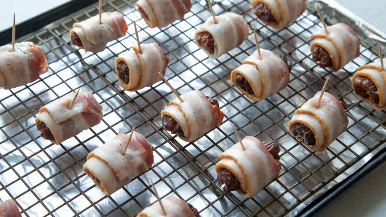 dates wrapped in raw bacon