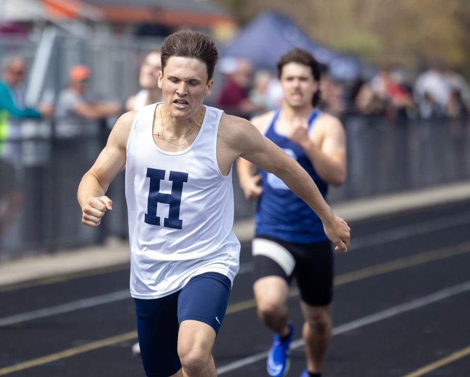 Cameron Cheetam ran on three school-record relay teams for Hartland in a track and field meet against Brighton.