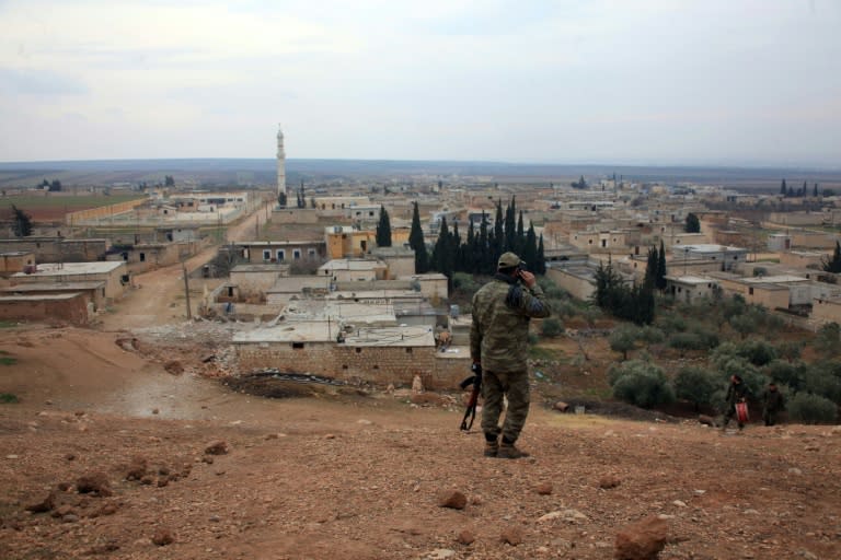 A member of the Syrian government forces patrols on the northern outskirts of the embattled city of Aleppo on February 11, 2016