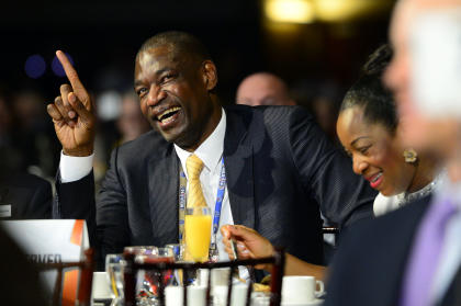 Dikembe Mutombo laughs during the 2014 NBA All-Star Game Legends Brunch. (Bob Donnan-USA TODAY Sports)