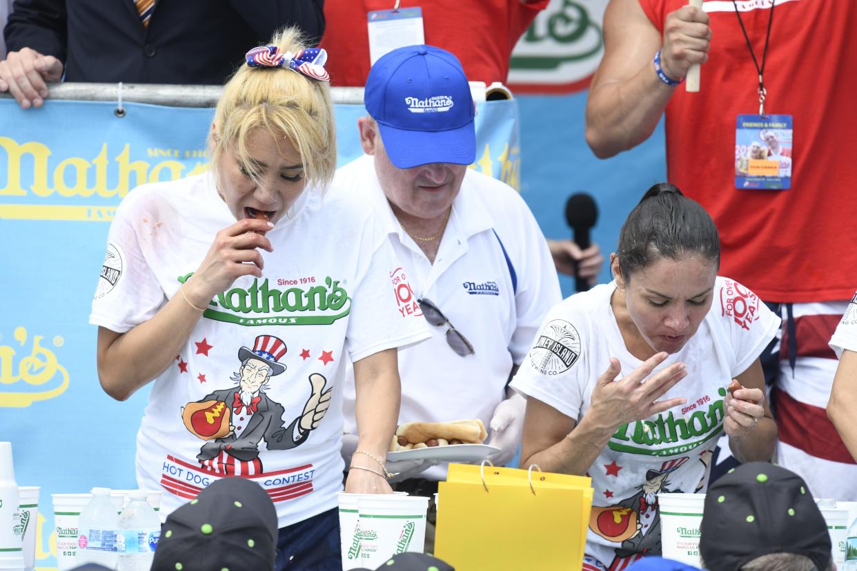 Miki Sudo consumes hot dogs during the Nathan’s Hot Dog Eating Contest, Wednesday, July 4, 2018, at Coney Island, New York. 