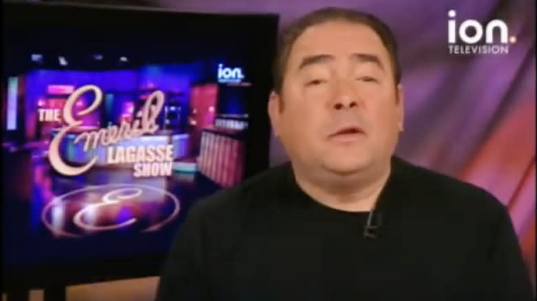 emeril lagasse talking by tv monitor