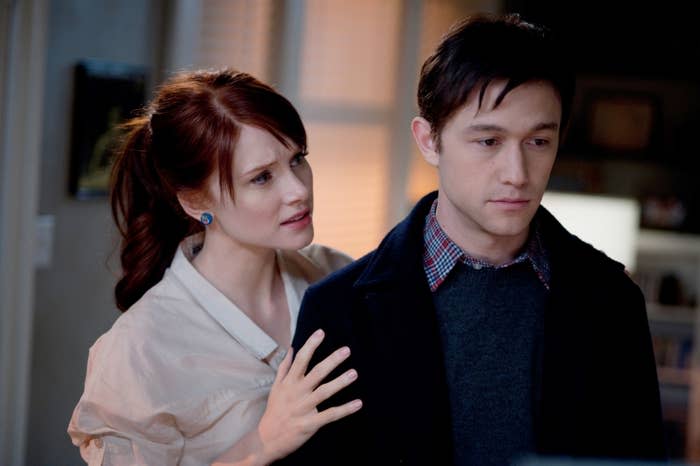 Bryce Dallas Howard talks to Joseph Gordon-Levitt while holding his arms