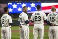 Mar 29, 2018; Seattle, WA, USA; Seattle Mariners second baseman Robinson Cano (22) stands during the national anthem before a game against the Cleveland Indians at Safeco Field. Mandatory Credit: Joe Nicholson-USA TODAY Sports