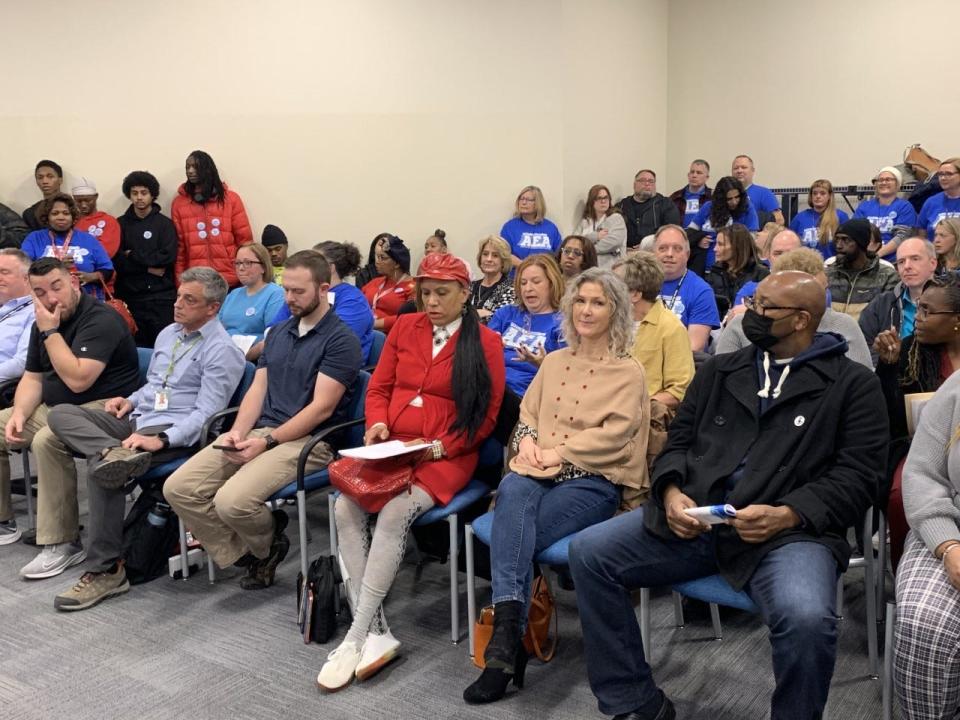 Members of the Akron Education Association teachers union and others pack Monday night's Akron Board of Education meeting.
