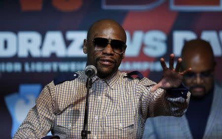 Boxing - James DeGale & Badou Jack Head-to-Head Press Conference - Highline Ballroom, New York City, United States of America - 12/1/17 Floyd Mayweather during the press conference Action Images via Reuters / Andrew Couldridge Livepic EDITORIAL USE ONLY.