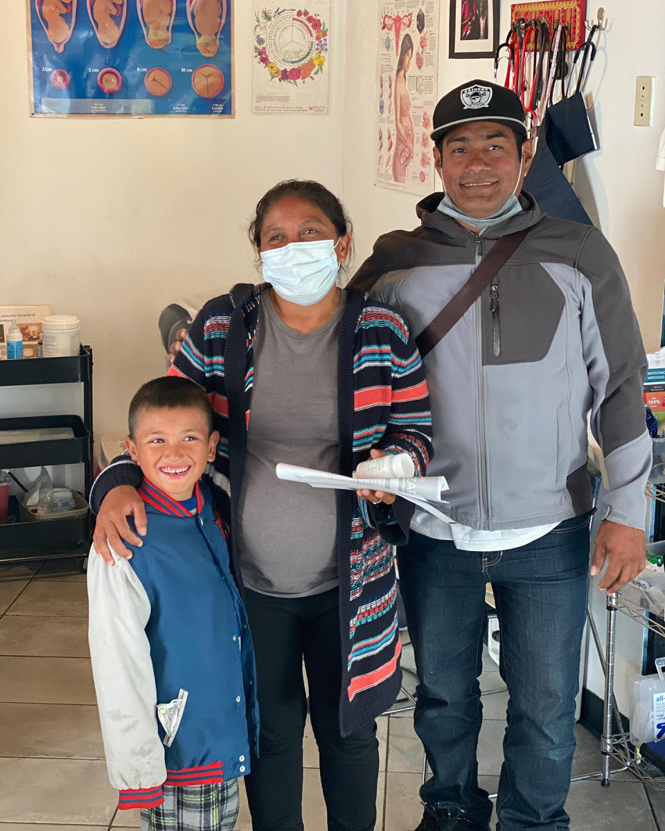 Claudia, center, with her son Joseph, left, and partner Michal. She left an abusive husband in Honduras hoping to give Joseph and her new baby a better life in the U.S. “We can’t afford to fail,” she said. - Credit: Eli Cahan