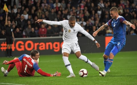 France substitute Kylian Mbappe engineered two late goals to rescue a 2-2 draw against Iceland and spare the blushes of the world champions in their friendly in Guingamp on Thursday.