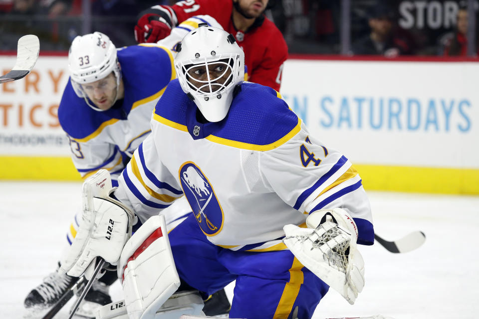 Buffalo Sabres goalie Malcolm Subban (47) watches the puck against the Carolina Hurricanes during the second period of an NHL hockey game in Raleigh, N.C., Saturday, Dec. 4, 2021. (AP Photo/Karl B DeBlaker)