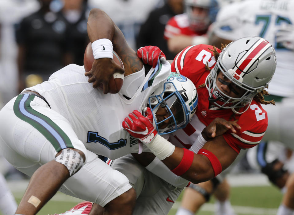 Ohio State defensive end Chase Young, right, sacks Tulane quarterback Jonathan Banks during the first half of an NCAA college football game Saturday, Sept. 22, 2018, in Columbus, Ohio. (AP Photo/Jay LaPrete)