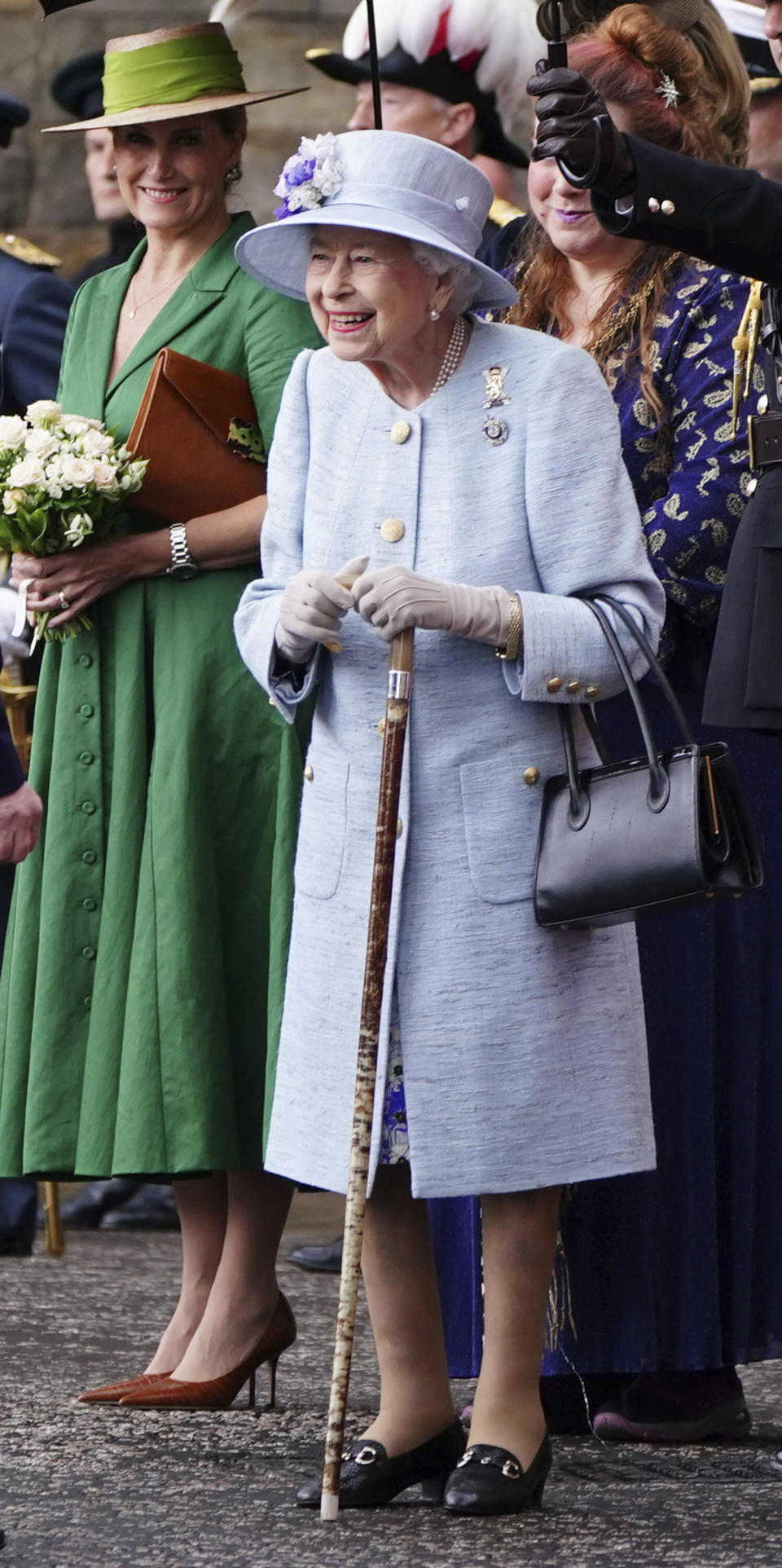 Britain's Queen Elizabeth II is greeted as she attends the Ceremony of the Keys on the forecourt of the Palace of Holyroodhouse in Edinburgh, Monday, June 27, 2022, as part of her traditional trip to Scotland for Holyrood week. (Jane Barlow/PA via AP)