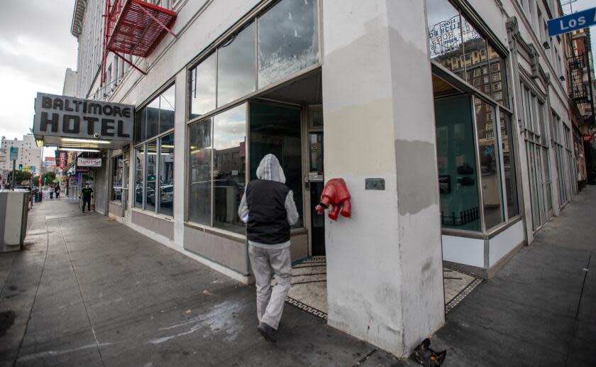 Los Angeles, CA - February 14: (**NOTE: This image is to be used for a specific story by Liam Dillon.) The Baltimore Hotel is located on the corner of 5th Street and Los Angeles Street on Tuesday, Feb. 14, 2023, in Los Angeles, CA. The Baltimore Hotel is another single-room occupancy (SRO) building owned by the AIDS Healthcare Foundation. (Francine Orr / Los Angeles Times)